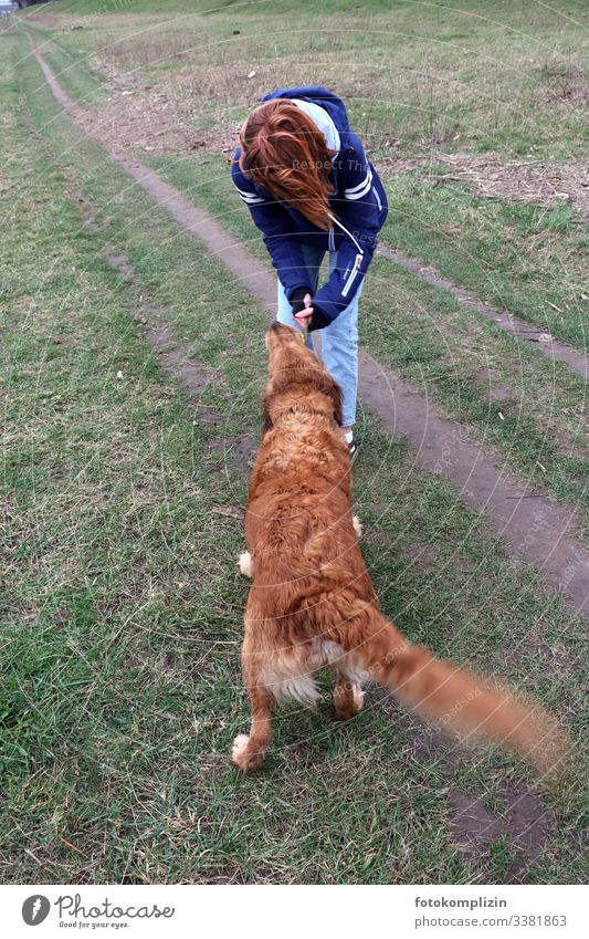 redheaded girl with redheaded dog Red-haired red hair Walk the dog Love of animals Dog animal-assisted therapy walk the dog To go for a walk Pet Man and dog