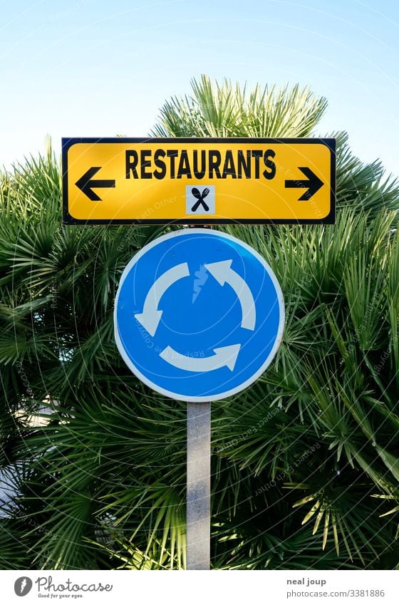 Joy Vacation & Travel Restaurant Palm tree Road sign Traffic circle Sign Signs and labeling Signage Warning sign Diet Select Uniqueness Nerdy Blue Yellow Brave