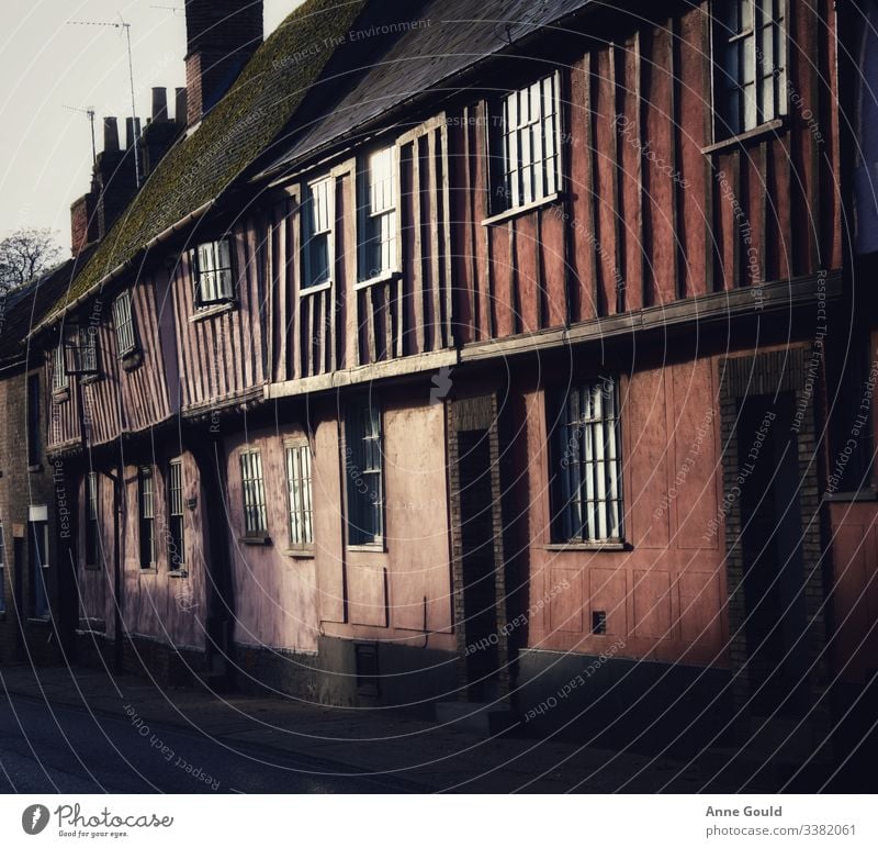 Pink houses - exterior street scene pink pink house cottages exterior shot windows windowpane morning early morning