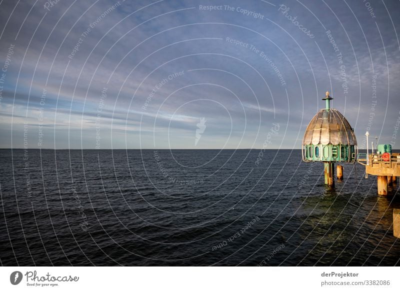 Evening sun with diving bell on the Zinnowitz sea bridge Mecklenburg-Western Pomerania Germany Island Baltic island Baltic Sea Destination Trip Hiking Discover