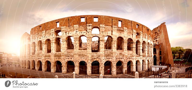 the Colosseum of Rome seen from behind at sunset. famous italian arena historical ruin colosseum rome amphitheater ancient ancient civilization ancient rome