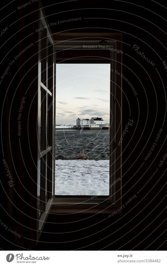 Open window with view of fishing cottage by the fjord and snowy jetty Vacation & Travel Trip Winter Snow Winter vacation Environment Landscape Sky Clouds Ice