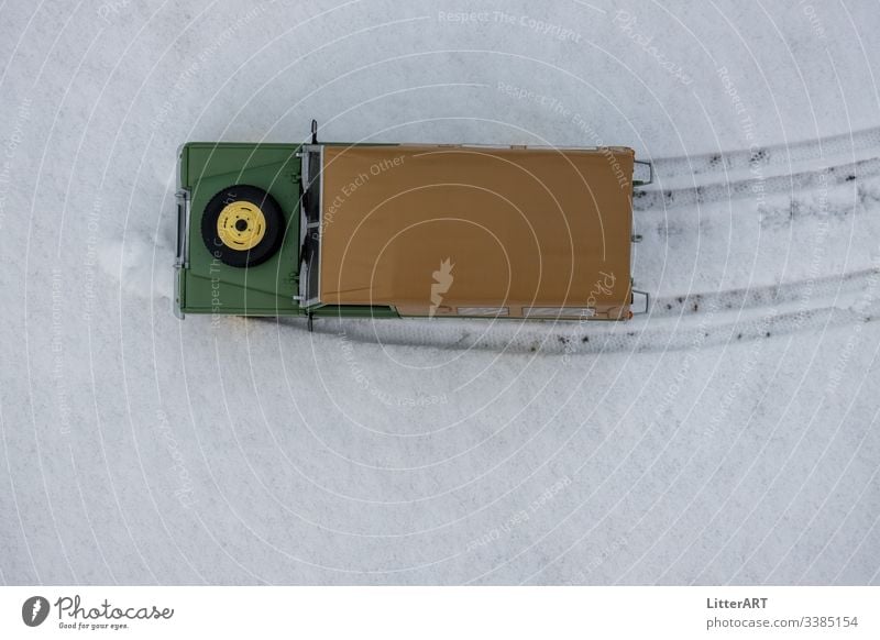 LAND ROVER SERIES IN FRESH SNOW FROM BIRD'S EYE VIEW country rover land rover series Vintage car 4x4 Adventure Winter Snow Virgin snow snow road winter tyres