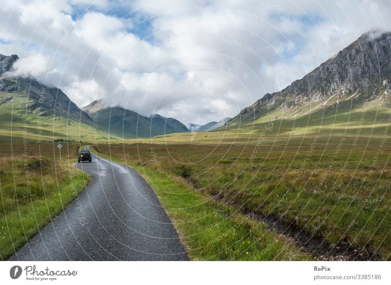 Single track road in the scottish highlands. Scotland lake Glencoe Scottish Britain England freedom meadow landscape sky natural mountain nature travel glenn