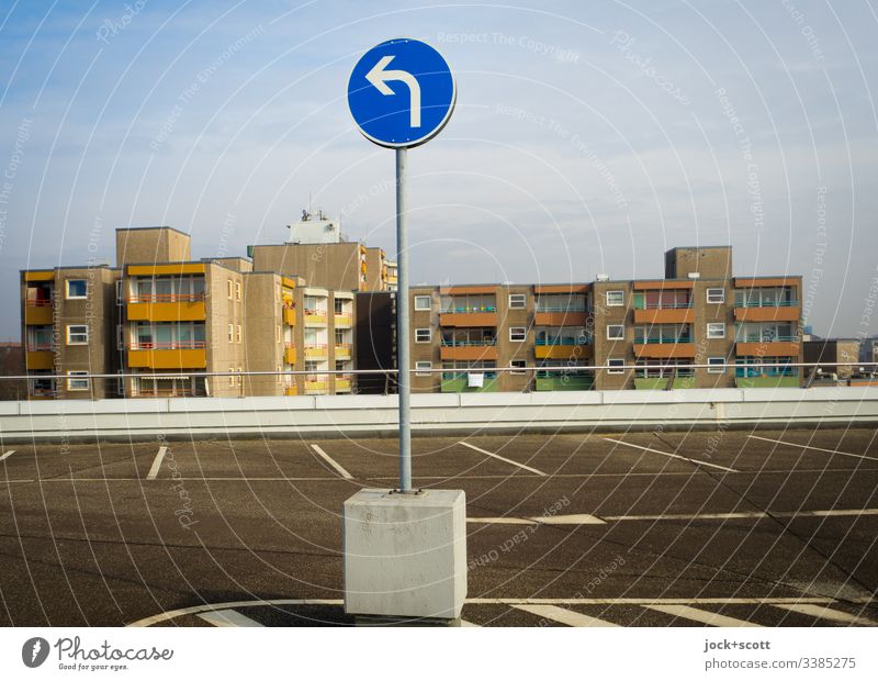 Only to the left, even if I'd rather go right Traffic regulation Free space Lane markings Authentic Parking lot Asphalt Parking level Parking garage Arrow