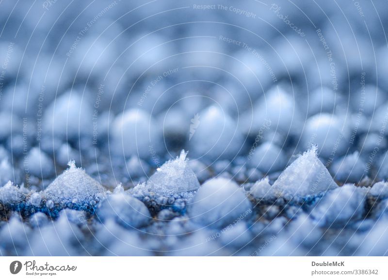 Ice crystals on small icicles Central perspective Shallow depth of field Blur Day Copy Space top Deserted Structures and shapes Pattern Abstract Experimental