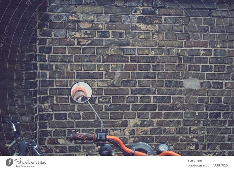 photographer is reflected in the motorcycle mirror in front of the wall Wall (barrier) Motorcycle Motorcycle handlebars Motorcycle mirrors Mirror Woman