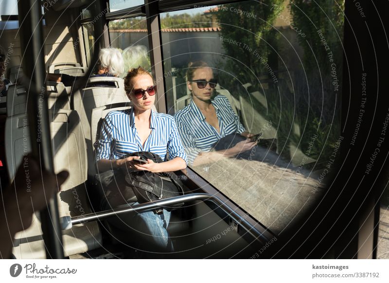 Portrait of tired woman sleeping on bus. passenger female nap commuter girl transportation inside journey people person tourism tourist beautiful work vacation