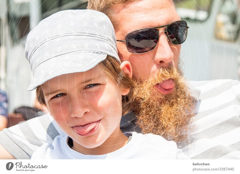 You don't, uh, stretch your tongue... Child Boy (child) Portrait photograph Contrast Light Day Detail Close-up Interior shot Colour photo Son Love Together