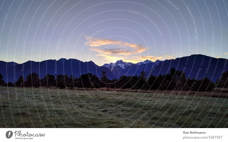 View on Mount Cook from Westcoast Mountain Mountain view Panorama (View) Snow Clouds Sunrise Sunrise behind mountains Blue sky Blue sky with little cloud