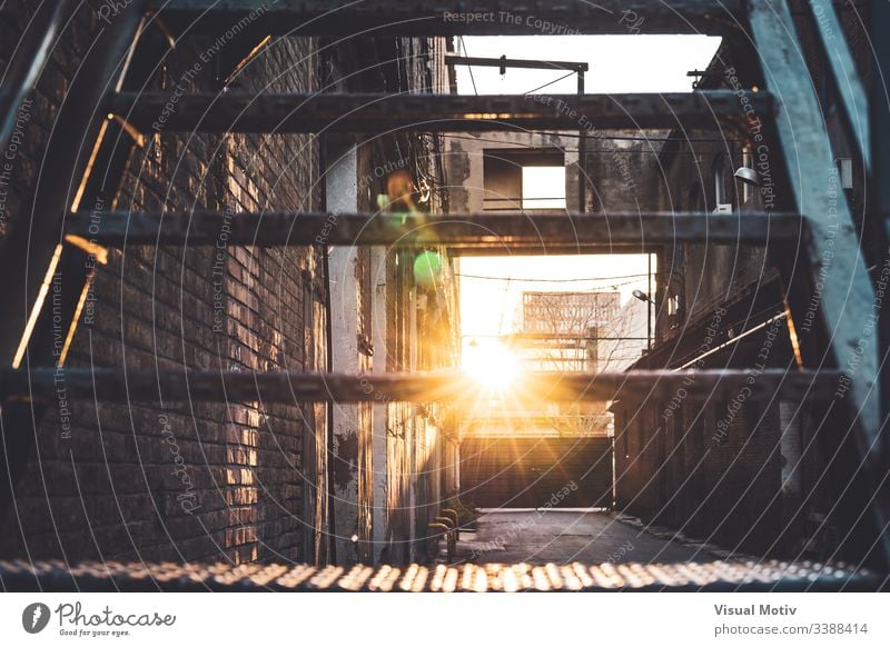 Sunbeam crossing the steps of an old factory abandoned afternoon afternoon light alley architectonic architectural architecture brick brick buildings bricks