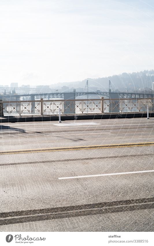 Graphical representation of a roadway on a bridge Street Traffic infrastructure Road marking Marker line graphically Exterior shot Asphalt Gray Transport Day