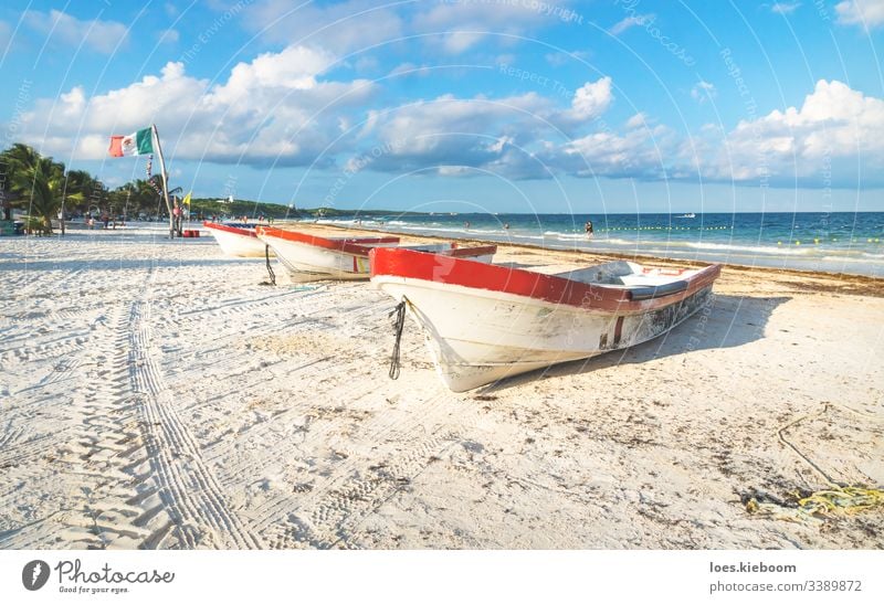 Boats on white sand at Playa Pescadores, Tulum, Mexico beach tulum mexico nature ocean sea playa pescadores summer tourism tropical water beautiful blue boat