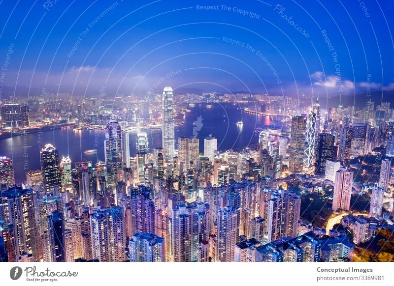 Hong Kong from Victoria peak at dusk, Hong Kong, China. Asia. architecture asia business china city cityscape downtown elevated view harbor hong hong kong