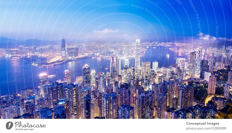 Panoramic image of Central Hong Kong and Victoria Harbour from Victoria peak at dusk Hong Kong, China. Asia. architecture asia business china city cityscape