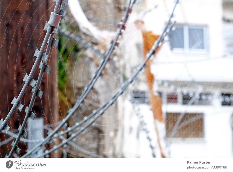 Barbed wire at the border through Nicosia in Cyprus North Cyprus Border green line demarcate Protection Safety Buffer zone Conflict border protection