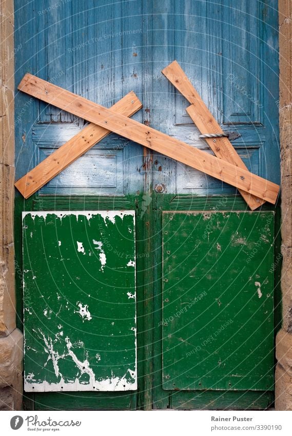 Locked and barred door in Nicosia, Cyprus locked Closed wooden Wood gate buffer zone border abandoned abandoned house