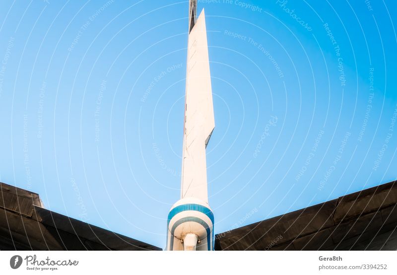 wings of a large airliner on a blue background abstract air transport airlines airplane aviation color engineering flaps flight fly fuselage iron isolated