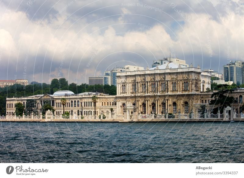 Dolmabahce Palace, view from the Bosphorus Strait in Istanbul, Turkey dolmabahce palace istanbul bosporus bosphorus turkey strait coastline facade architecture