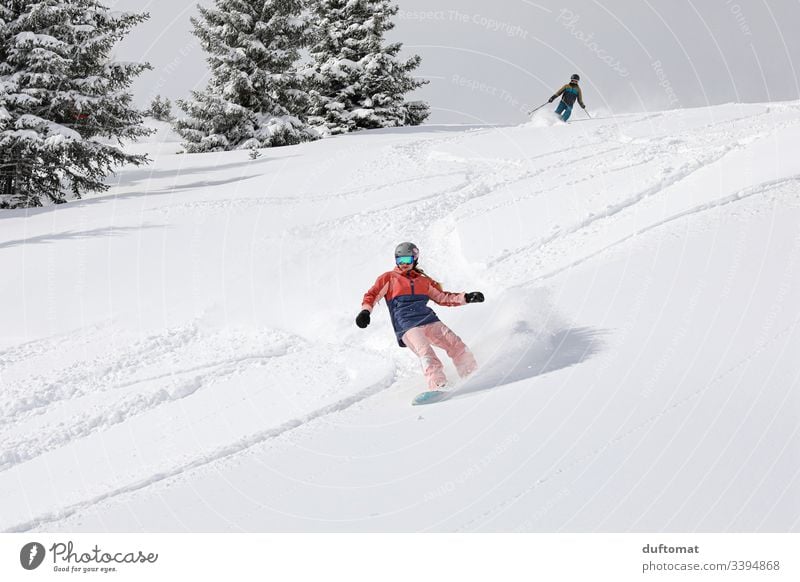 Downhill, board vs. ski Snowboard Girl Snowboarding Sports Winter sports Mountain Freestyle Powder snow Downward Ski run Deep snow Winter vacation Talented