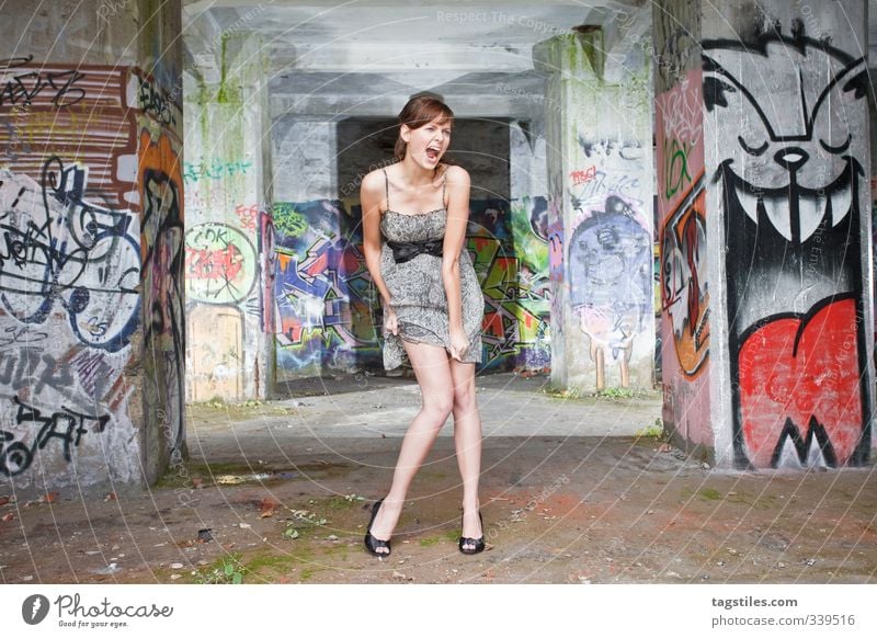 Scream Woman Graffiti Trashy Dismantling Decline Contrast Young woman Beautiful Old Dirty Wild Free Dress Brunette Eroticism High heels Warehouse Hall Ruin Legs