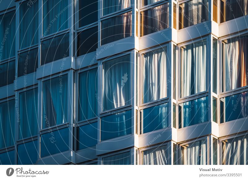 Eclectic glazed facade of an urban building urban facade Architecture structure windows glazed windows no people eclectic abstract background building facade