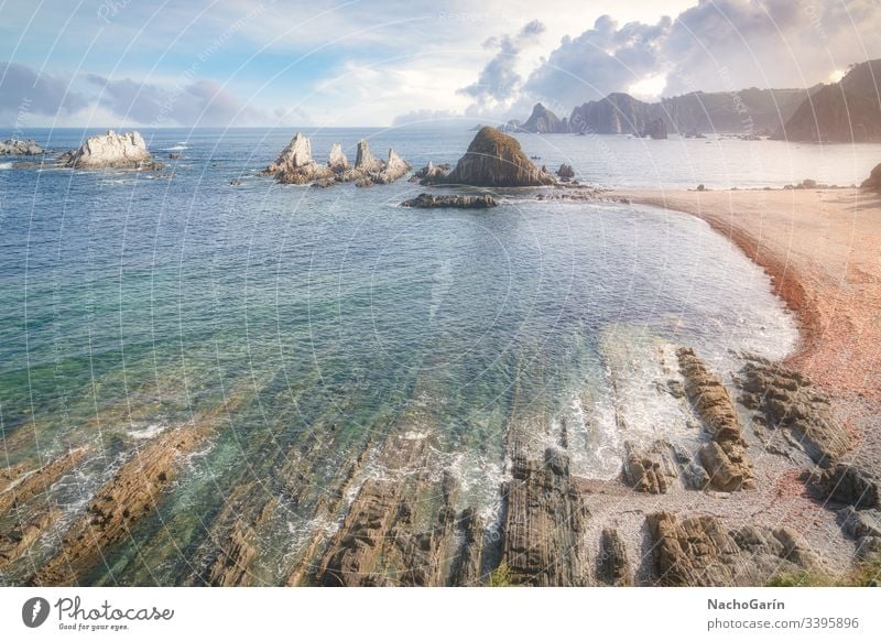 Amazing Gueirua beach at sunset in Asturias, Spain spain landscape nature sea ocean coast gueirua asturias stone seascape rock sky españa sharp cudillero shore