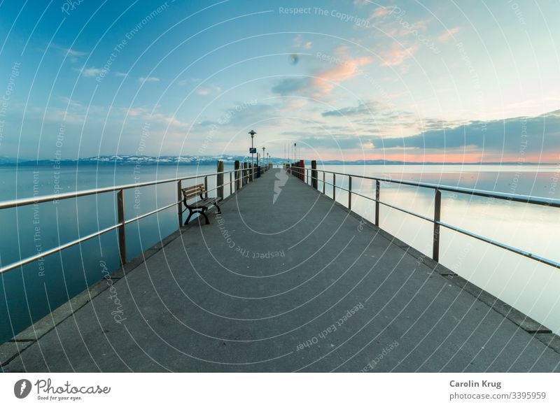 Recording of a landing stage at Lake Constance at dusk. Even with clear paths, sometimes it remains uncertain for all of us where they will lead us. Dusk