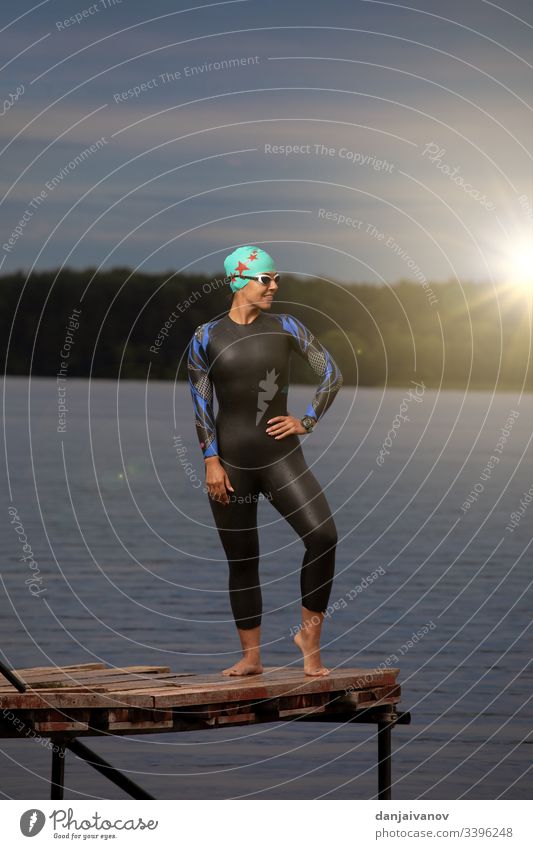 One caucasian woman practicing triathlon swimming sport people sportswear athlete female competition triathlete person swimmer one european swimsuit white