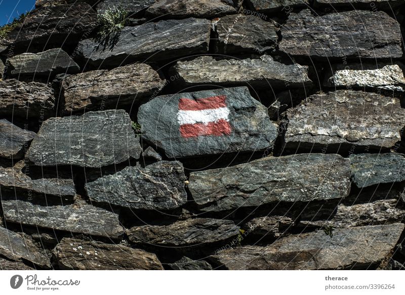 Flag navigation Austria alpine crossing Hiking Stone wall flag trail Alps long-distance hiking trail Adventure Mountain Orientation Sign Colour Reddish white