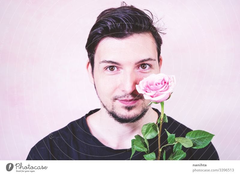 Portrait of new masculinity about a man with make up makeup male beauty gender trans transgender people real real people rose pink color flower delicate fragile