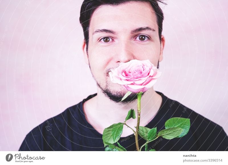 Portrait of new masculinity about a man with make up makeup male beauty gender trans transgender people real real people rose pink color flower delicate fragile