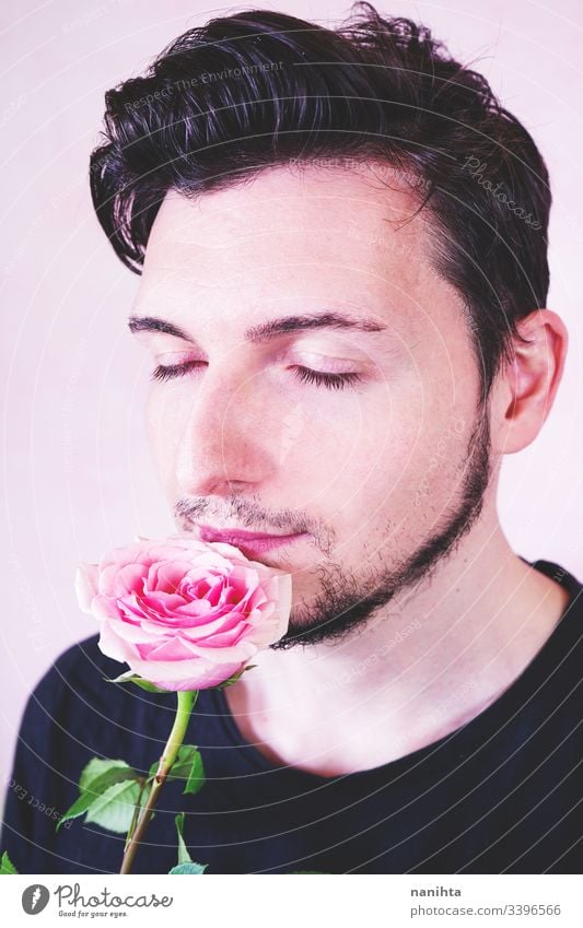 Portrait of new masculinity about a man with make up makeup male beauty gender trans transgender people real real people rose pink color flower delicate fragile