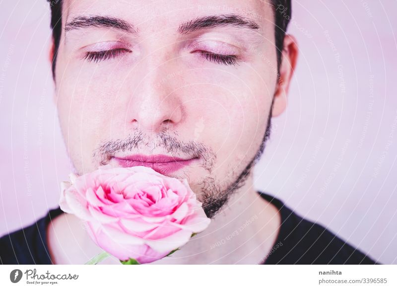 Portrait of new masculinity about a man with make up makeup male beauty gender trans transgender people real real people rose pink color flower delicate fragile