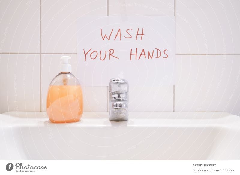 wash your hands handwritten notice above bathroom sink sign washing soap hygiene basin hand basin vanity basin washbowl washbasin washroom restroom clean