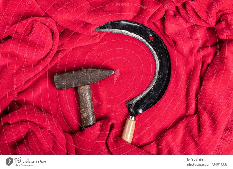 Hammer and sickle wrapped in a soft, red fleece blanket Red policy Politics and state Symbols and metaphors Communism Sign Tool Russia Socialism Might Past