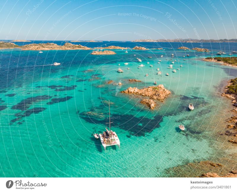 Drone aerial view of catamaran sailing boat in Maddalena Archipelago, Sardinia, Italy. italy sardinia costa smeralda sailboat bay beach nautics island coastline