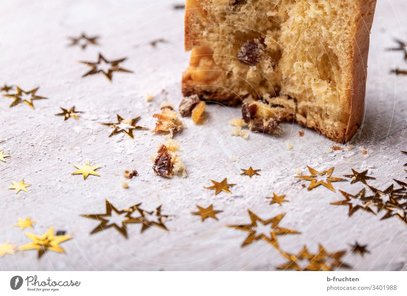 A piece of panettone Panettone Cake Stars Christmas Baking slice Raisins Dessert Baked goods Sweet Delicious Tasty homemade Self-made Advent Christmas & Advent