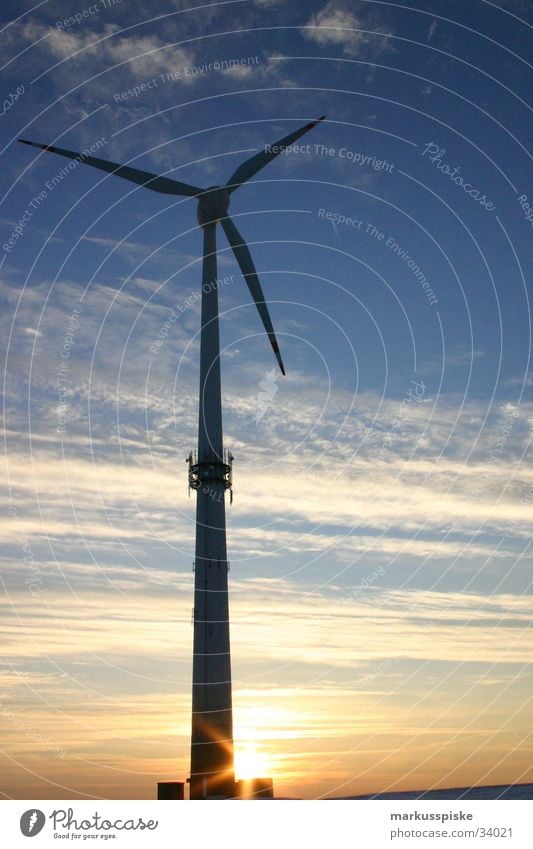 Windmill in decline Alternative Clouds Clean Environment Electricity Industry Wind energy plant Sky Sun Lighting Energy industry Shadow Delicate Sunset