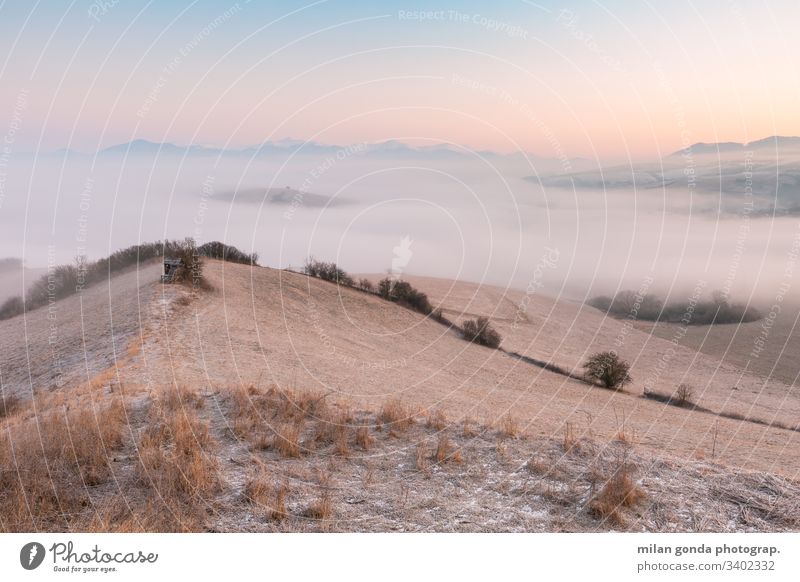 Foggy morning in Turiec region, Slovakia. landscape countryside rural nature mountains Mala Fatra Carpathians hunting lookout sunrise fog mist