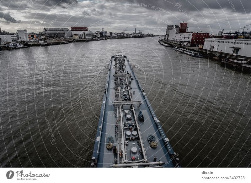 Inland tanker sailing between Mannheim and Ludwigshafen down the lovely Rhine Navigation Watercraft Inland navigation River water vein River bank Colour photo