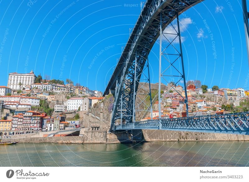 Dom Luis Bridge in Porto, Portugal porto portugal view old town douro city aerial europe river cityscape historic portuguese oporto travel tourism colorful