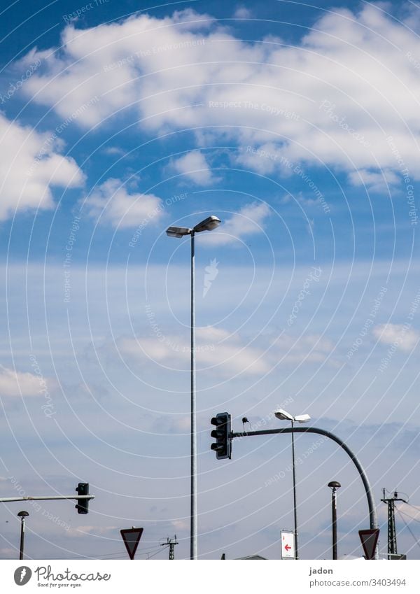 lamp shop. Lantern Traffic light Transport Street lighting Lighting Road traffic Town Lamp Sky Clouds Blue White cityscape lines bows