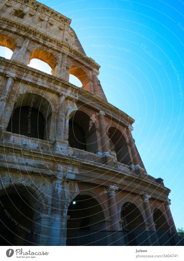 Colosseum travel touristic Tourism Summer Stone Stadium Sky Sightseeing Ruin Rome Roman Romany Old Monument Mediterranean Landmark Italy Italian Imperial