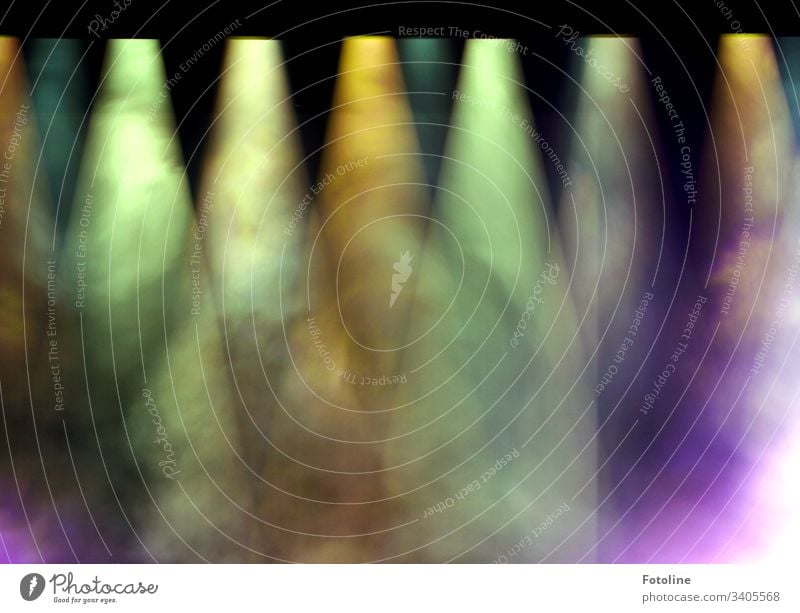 Spotlight - or differently coloured headlights with wafts of fog over a stage limelight Floodlight Light Dark Bright Stage Stage lighting Black Green Yellow