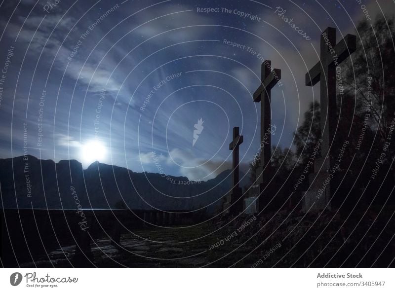 Stone crosses in mountains in sunny day religion symbol sky nature landscape stone travel tourism spain basque sunshine dark environment adventure construction