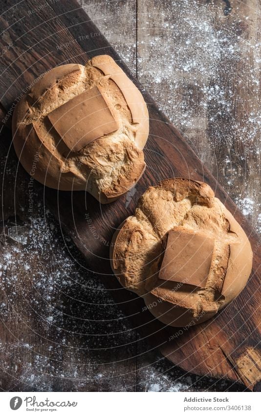 Fresh bread on wooden board bakery fresh table old rustic flour food baked homemade pastry cuisine delicious tasty loaf tradition crust gourmet composition