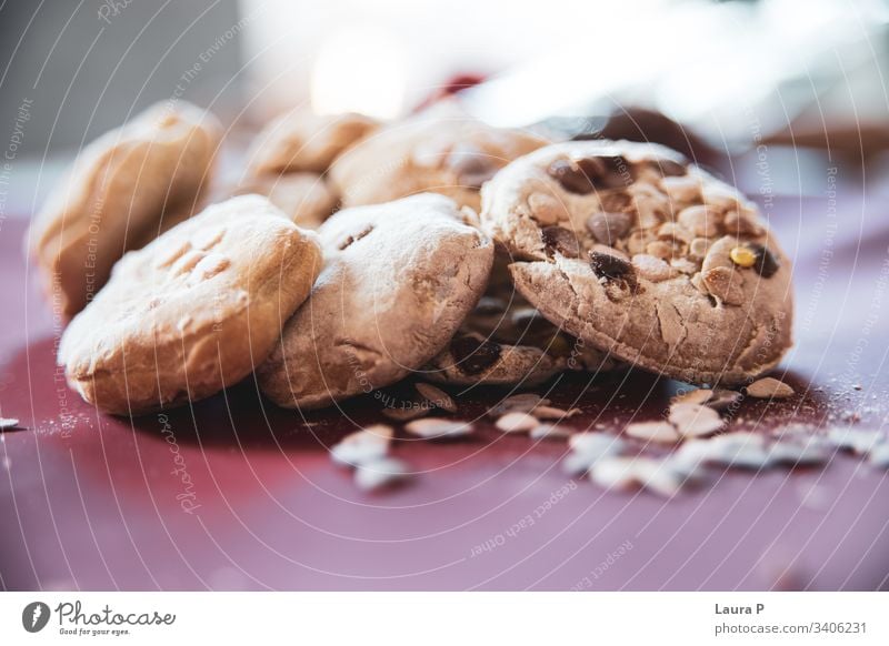 Close up of delicious home-made baked sweets close up Bakery shop Baked goods dessert biscuits tasty food snack fresh raw healthy chocolate raisins baking brown