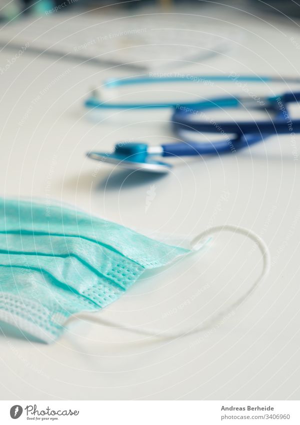 Medical mouthguard on a doctor's desk, selective focus on the foreground professional safeguard protective face guard influenza virus contamination