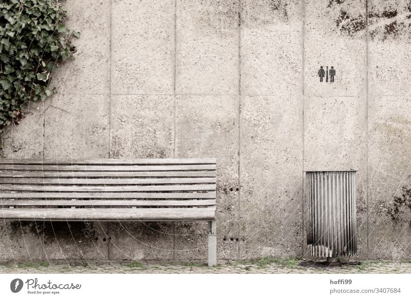 Still life of bench trash can with graffiti and ivy Bench rubbish bin Ivy Graffiti Concrete wall Gray symbol Toilet Deserted Wall (barrier) Day Wall (building)